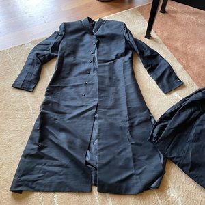 Sherwanis in black and cream. Has matching bottoms. Red dupatta with one.